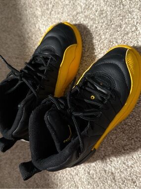 Jordan 12 Black and Yellow High-Top Sneakers